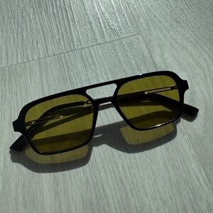 Black and Silver Sunglasses with Yellowish green lenses!